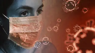Mask wearing woman follows COVID-19 safety measures